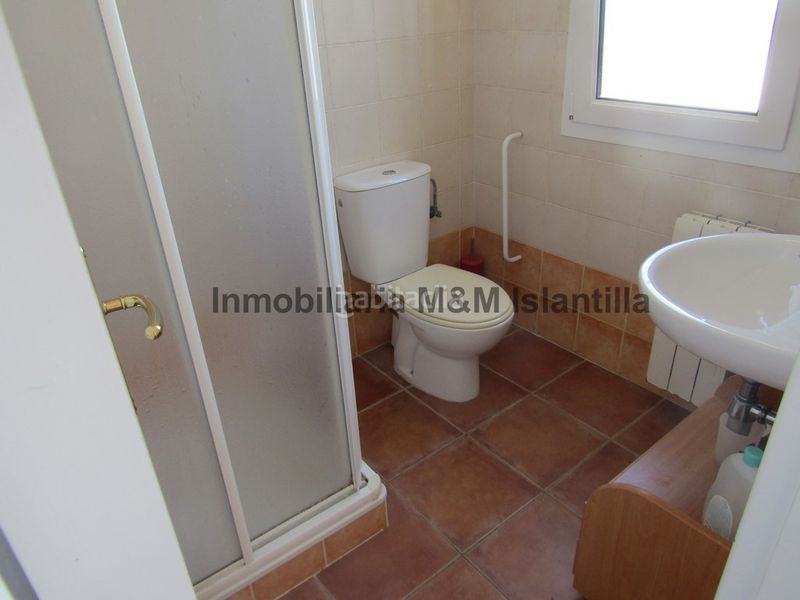 Foto 45a152df-74eb-4eeb-8961-1a1b98c5b10e. Casa adossada amb aparcament piscina a Islantilla golf Islantilla