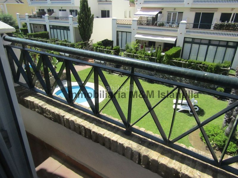 Foto 54f1c08a-54b7-4951-84dc-27bcf3716daf. Casa adossada amb aparcament piscina a Islantilla golf Islantilla