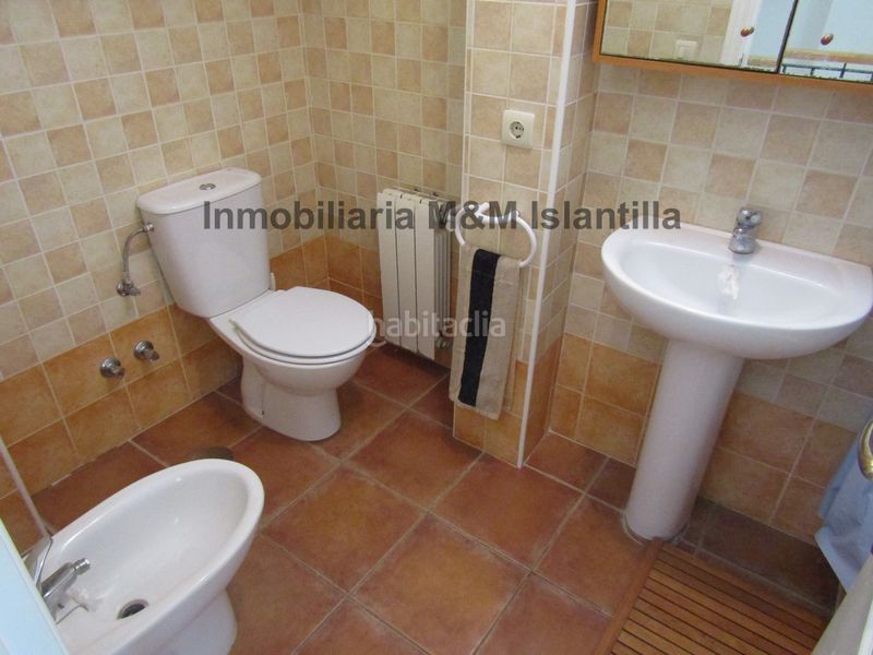 Foto 778a8bc5-5b52-421f-8f2e-3d7d2d998c6b. Casa adossada amb aparcament piscina a Islantilla golf Islantilla