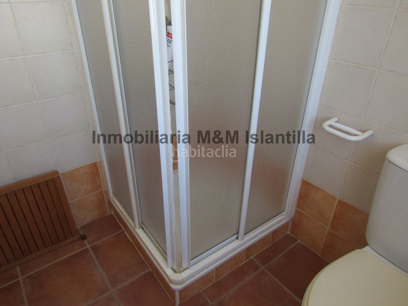 Foto 7a2ff13f-7032-4fb2-877b-ea05fe76a83c. Casa adossada amb aparcament piscina a Islantilla golf Islantilla