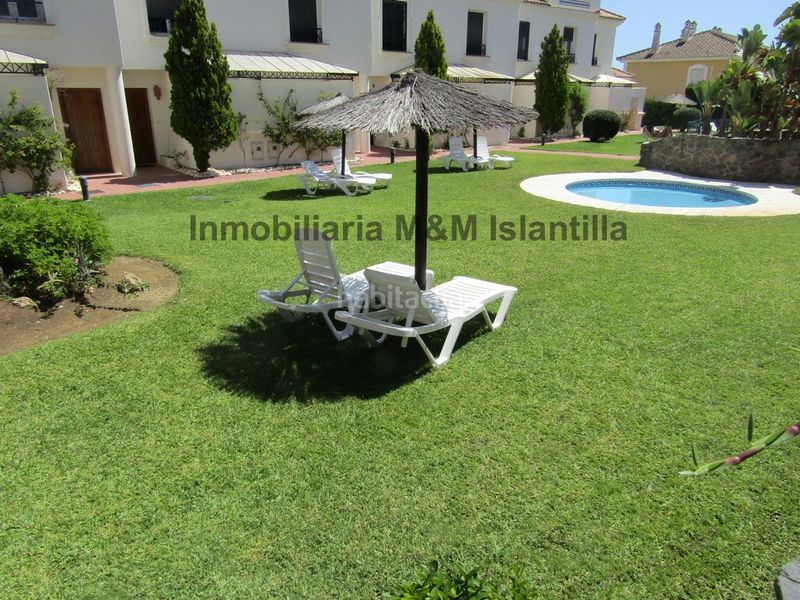 Foto 80a2a408-3951-48e3-beaf-0a2c7c5cba2f. Casa adossada amb aparcament piscina a Islantilla golf Islantilla