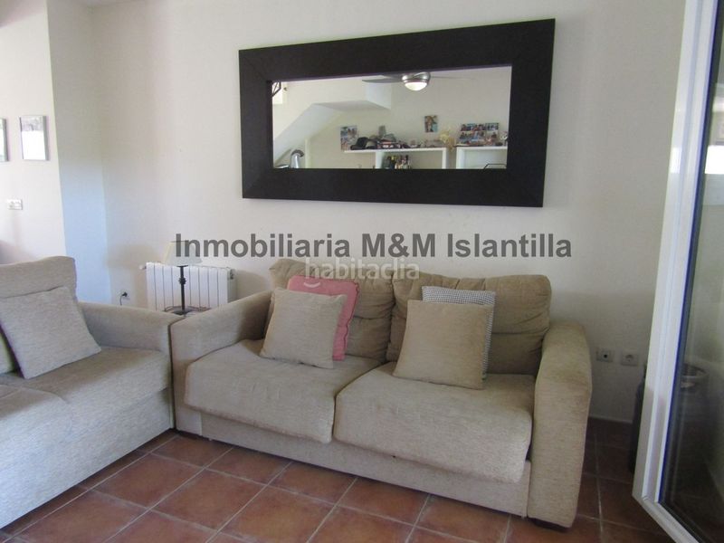 Foto ab100591-591c-4c4f-a241-5ff679897f90. Casa adossada amb aparcament piscina a Islantilla golf Islantilla