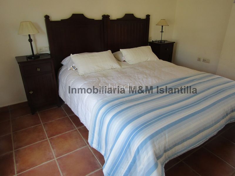 Foto d3b5fef7-c8ae-4ae5-9445-6581f18b3ee4. Casa adossada amb aparcament piscina a Islantilla golf Islantilla
