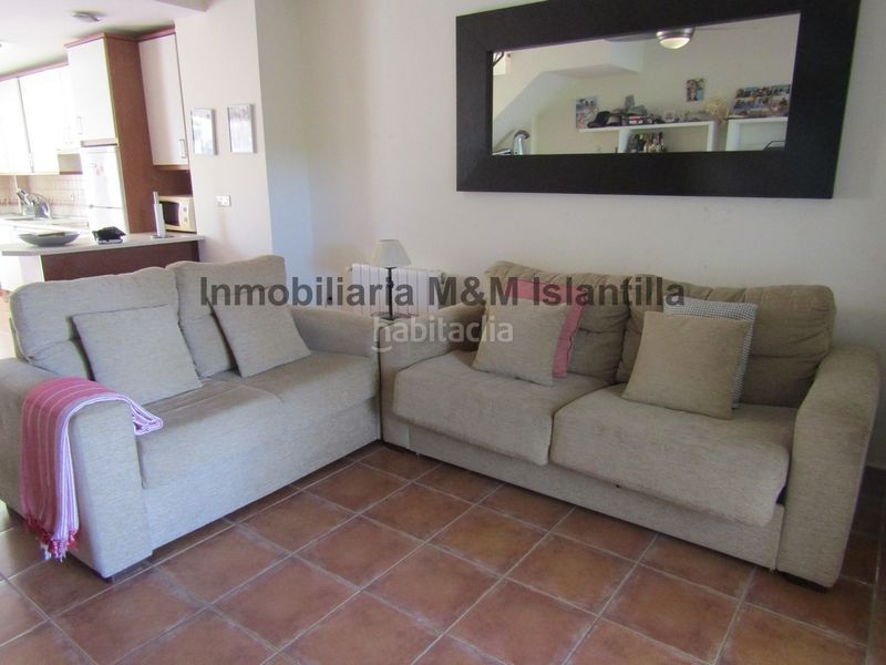 Foto f469cf4c-e82d-4ed8-9747-d0ac4ee9794e. Casa adossada amb aparcament piscina a Islantilla golf Islantilla