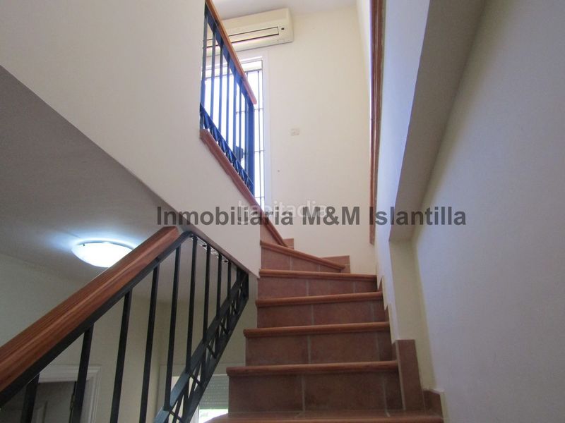 Foto f951c1f6-f08d-428a-8e2c-9d1e8bfa16ce. Casa adossada amb aparcament piscina a Islantilla golf Islantilla
