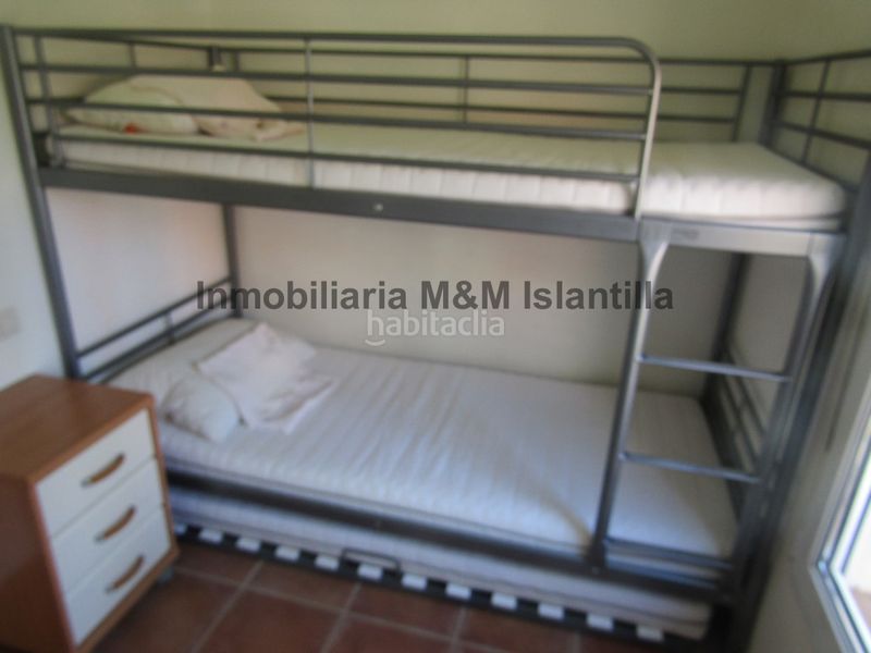 Foto fd8ef997-3011-426e-9166-0ba7281a89ce. Casa adossada amb aparcament piscina a Islantilla golf Islantilla
