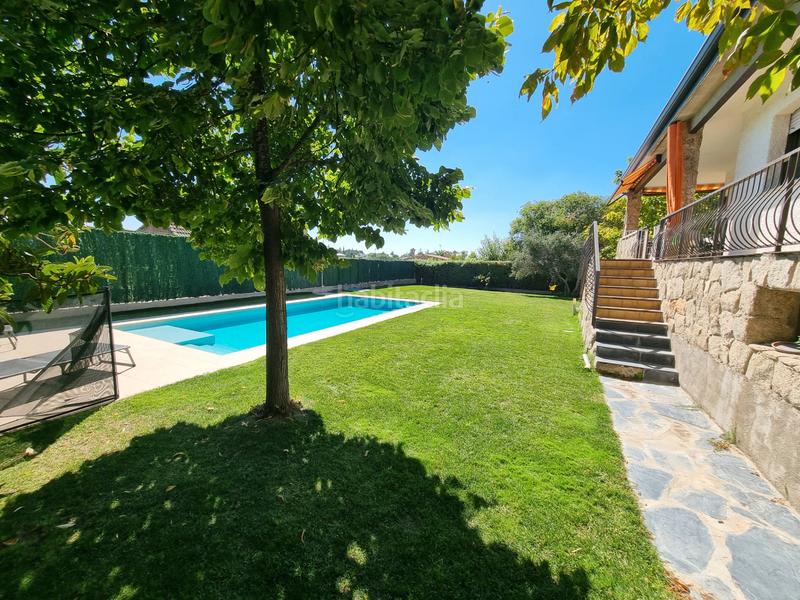 Foto b94d1376-fd7e-4c0f-85ac-5778cb84ffd7. Chalet avec cheminée chauffage parking piscine dans Villaviciosa de Odón