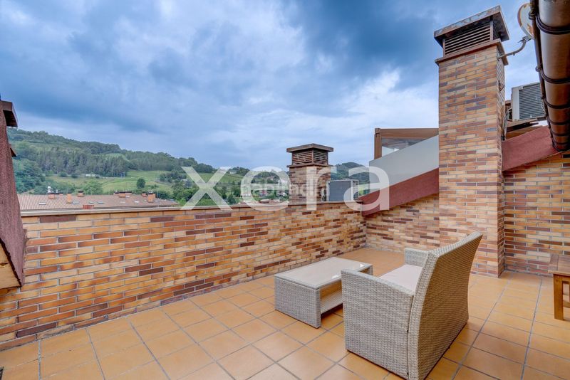 Foto aab00e8c-4fdb-4d2c-9c39-35616b5f0963. Casa adossada amb calefacció a Urnieta