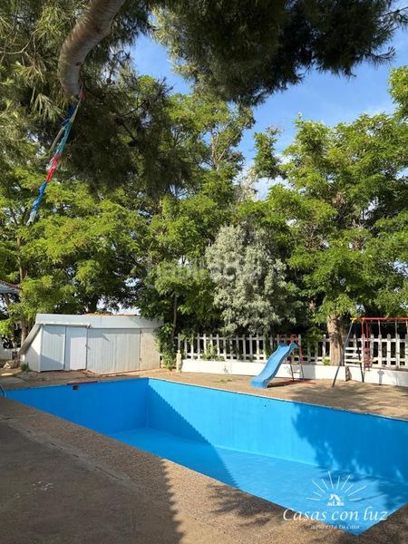 Foto ddaa85ba-03f0-40c3-b510-0b080422ea1d. Masia amb piscina a Garrapinillos Zaragoza