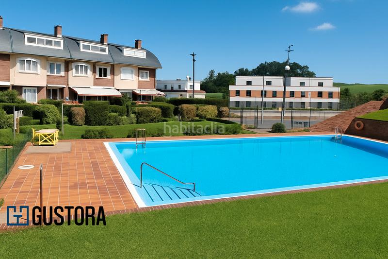 Foto 42ca665e-1a8c-4913-9677-2cdbe3ed5663. Casa aparellada amb calefacció aparcament piscina a Lasarte - Oria