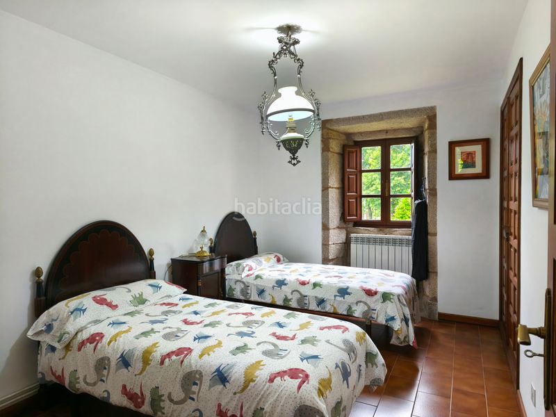 Foto bb39fecf-7943-4936-89ad-dec0f21bf222. Casa amb xemeneia calefacció aparcament a Castiñeiriño - Cruceiro de Sar Santiago de Compostela