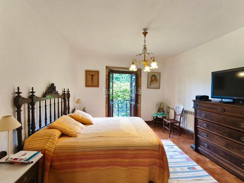 Foto 24746380-b4b8-458f-a8ca-4cfc13616308. Masia amb xemeneia calefacció aparcament a Castiñeiriño - Cruceiro de Sar Santiago de Compostela