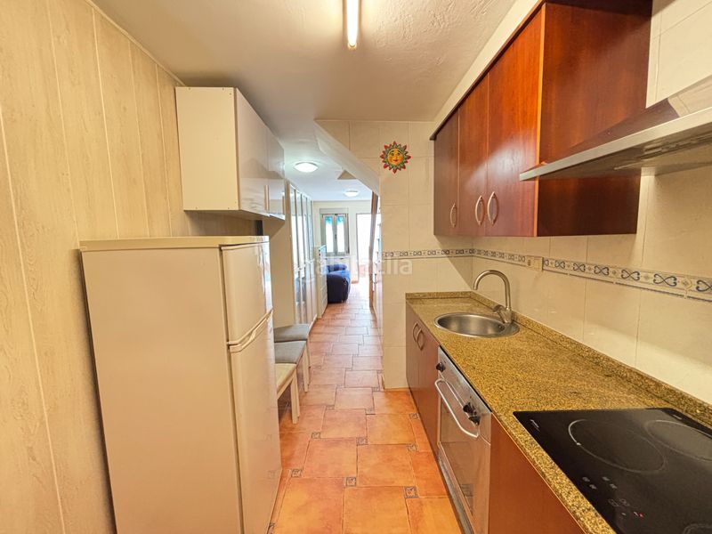 Foto b301ceec-2258-4d8d-930a-72c7aac77f2e. Casa adossada amb calefacció a Rianxo