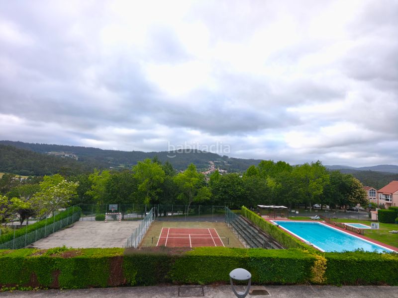 Foto f350c6f5-1ded-42d7-bfae-df740ca652f1. Casa aparellada amb calefacció aparcament piscina a Brión