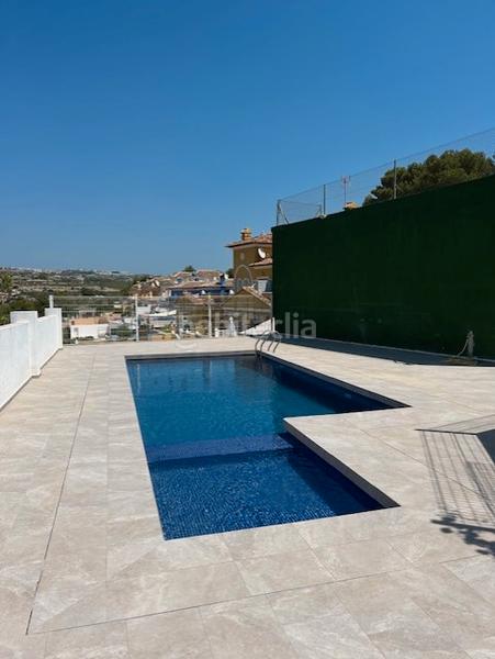 Foto f6e377e6-26f1-4e0c-9daa-478ba47badf9. Reihenhaus mit parking pool in La Empedrola Calp