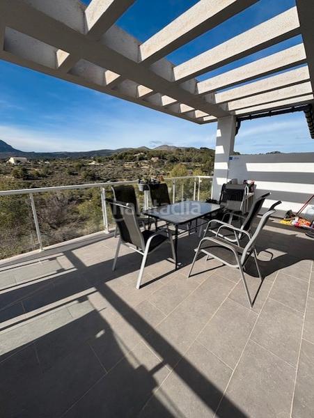 Foto 2e9dec31-495f-486c-9216-59ddb77a746e. Casa aparellada amb aparcament piscina a La Empedrola Calp