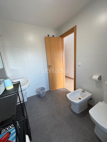 Foto 4180a704-7960-4c26-9e07-1a9857eccd57. Casa aparellada amb aparcament piscina a La Empedrola Calp