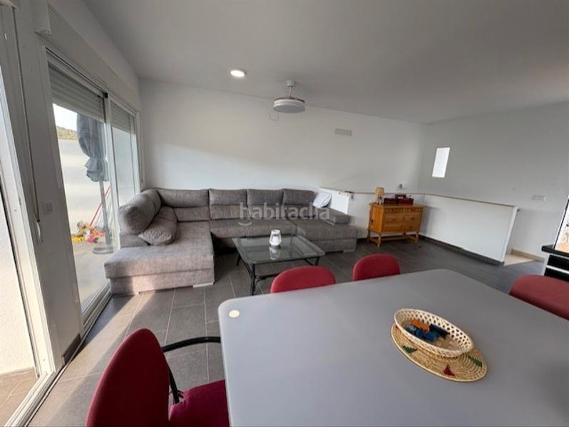 Foto 454aa0b3-b08a-4c18-87bb-de88a32b52ad. Casa aparellada amb aparcament piscina a La Empedrola Calp