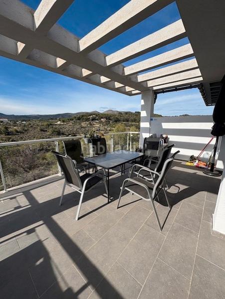 Foto 55693845-bb28-43c7-af1c-20d7d89eef72. Casa aparellada amb aparcament piscina a La Empedrola Calp