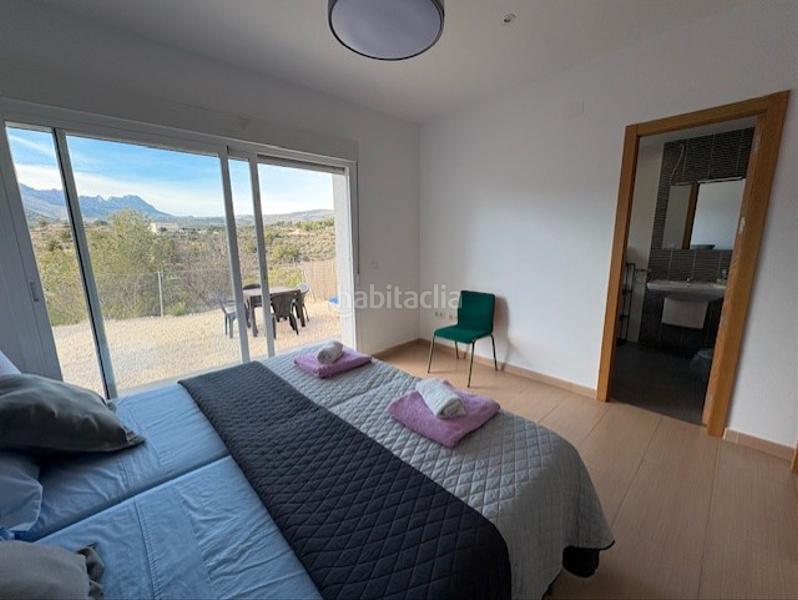 Foto 6b2d3f41-dfd2-409a-8a92-00d92bfb1076. Casa aparellada amb aparcament piscina a La Empedrola Calp