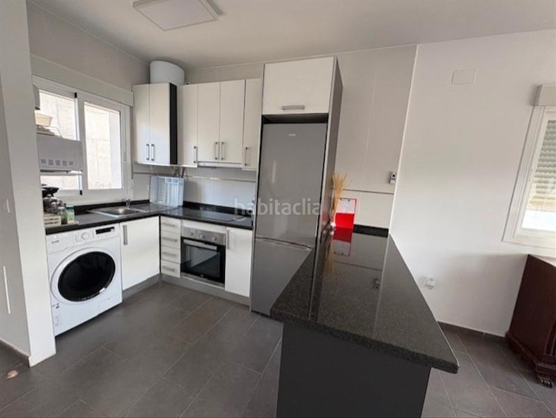 Foto 7a7b68b9-78e6-457d-984f-8cb18a103f78. Casa aparellada amb aparcament piscina a La Empedrola Calp