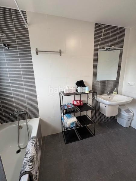 Foto 7ea1fde9-f8c3-436c-95b6-e8efb138c418. Casa aparellada amb aparcament piscina a La Empedrola Calp