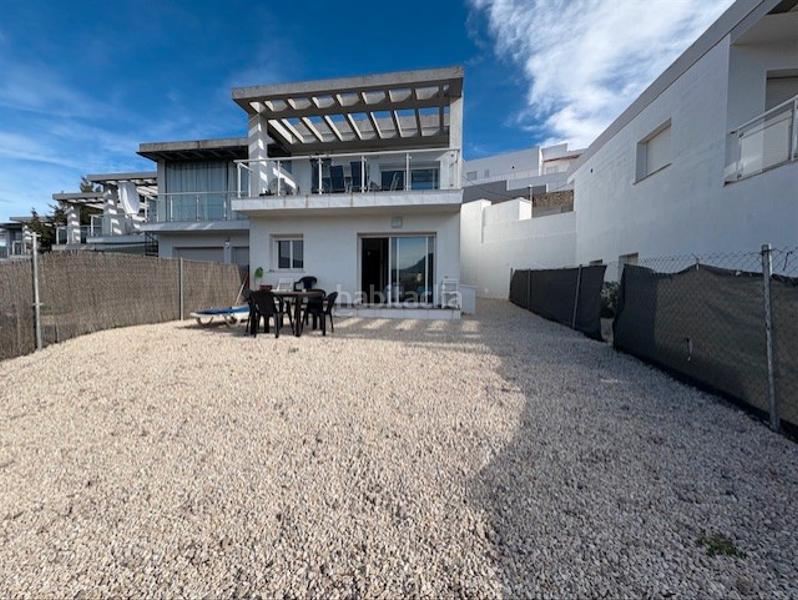 Foto 91bf181b-778f-40a0-9abd-a9ce0388ff4b. Casa aparellada amb aparcament piscina a La Empedrola Calp