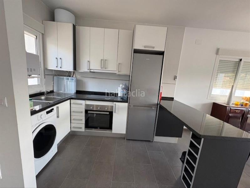 Foto f991b016-6727-4368-b745-558b5f757684. Casa aparellada amb aparcament piscina a La Empedrola Calp