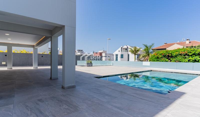 Foto 81dd3163-1872-414f-b8d9-2ad6725cc0b6. Casa descubra esta impresionante villa de nueva construcción situada en la prestigiosa zona de el madroñal, costa . ubicada en una en Adeje
