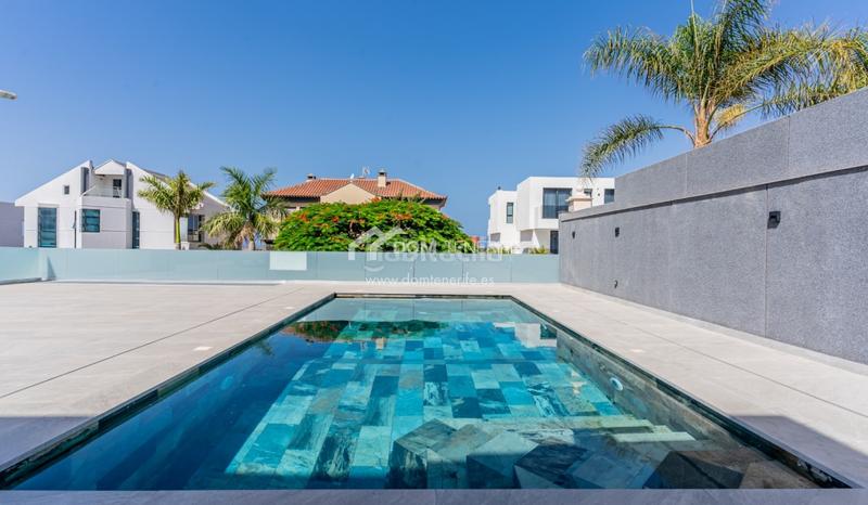 Foto 97cb430e-60b2-431d-bf79-dd8efc78f903. Casa descubra esta impresionante villa de nueva construcción situada en la prestigiosa zona de el madroñal, costa . ubicada en una en Adeje