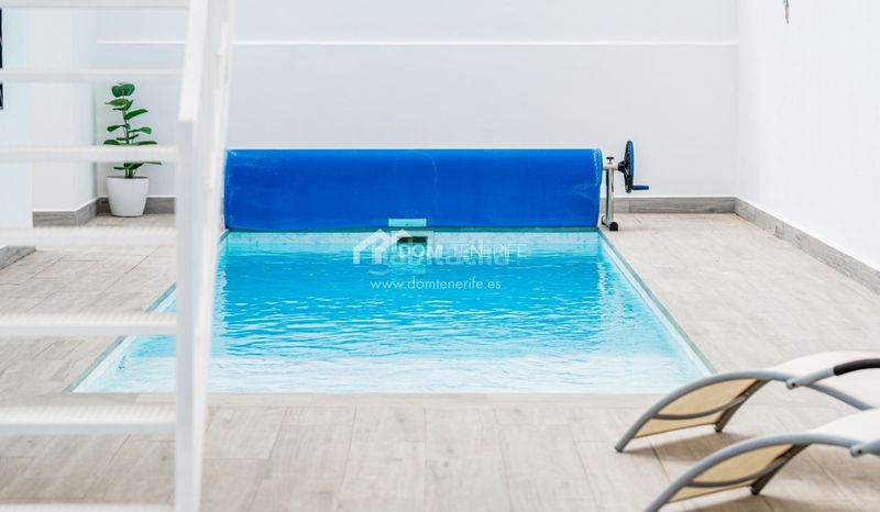 Foto 782f7c5d-d9e5-436b-ab2c-a84547dc0cce. Casa amb aparcament piscina a San Eugenio Alto Adeje
