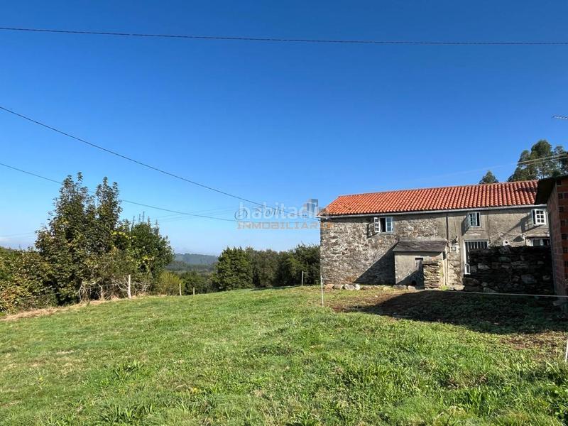 Foto fbc37fde-1908-44ff-ac8c-6c4aaf985f90. Casa con parcheggio in Somozas (As)