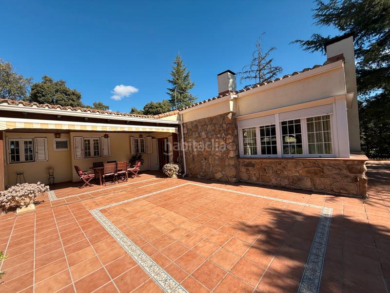 Foto 765fb7c3-f05e-48da-8e8d-3f5337528870. Chalet avec cheminée chauffage parking piscine dans Valdemorillo