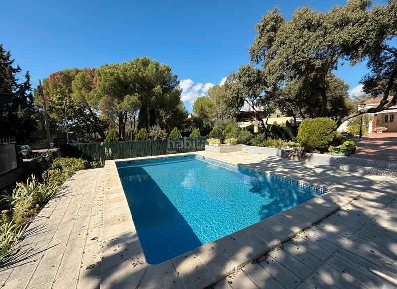 Foto 98551d2d-dfda-4dde-9c7f-c426af1c17b1. Chalet avec cheminée chauffage parking piscine dans Valdemorillo