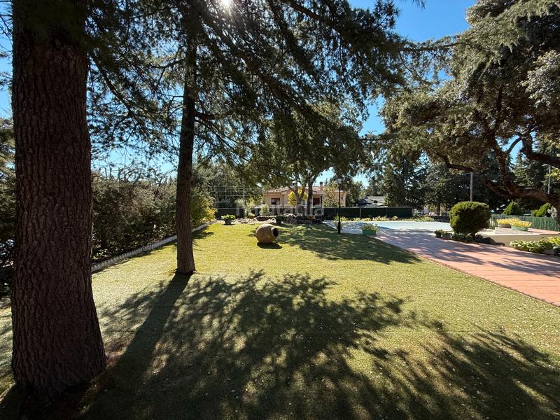 Foto ef97b0ae-35bb-48c1-82d3-a2697fad00af. Chalet con camino riscaldamento parcheggio piscina in Valdemorillo