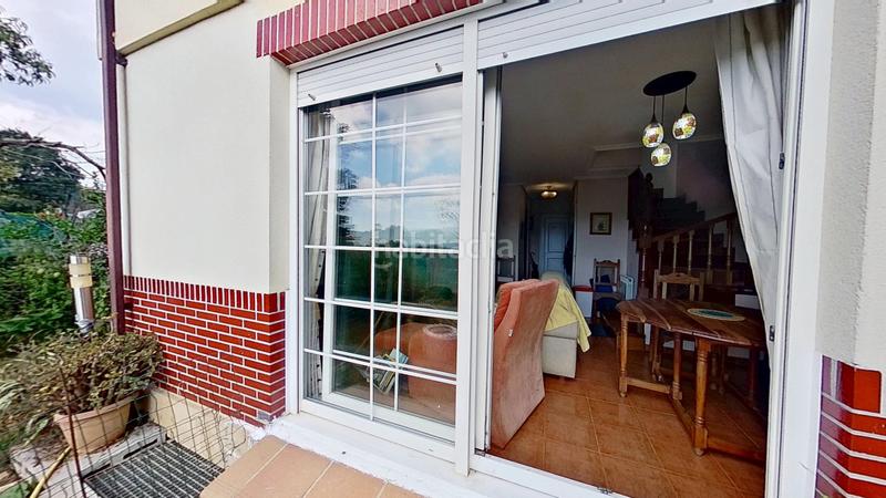 Foto d17bd296-f053-400c-bb06-3a9c458cf2f2. Casa amb calefacció aparcament a Reocín