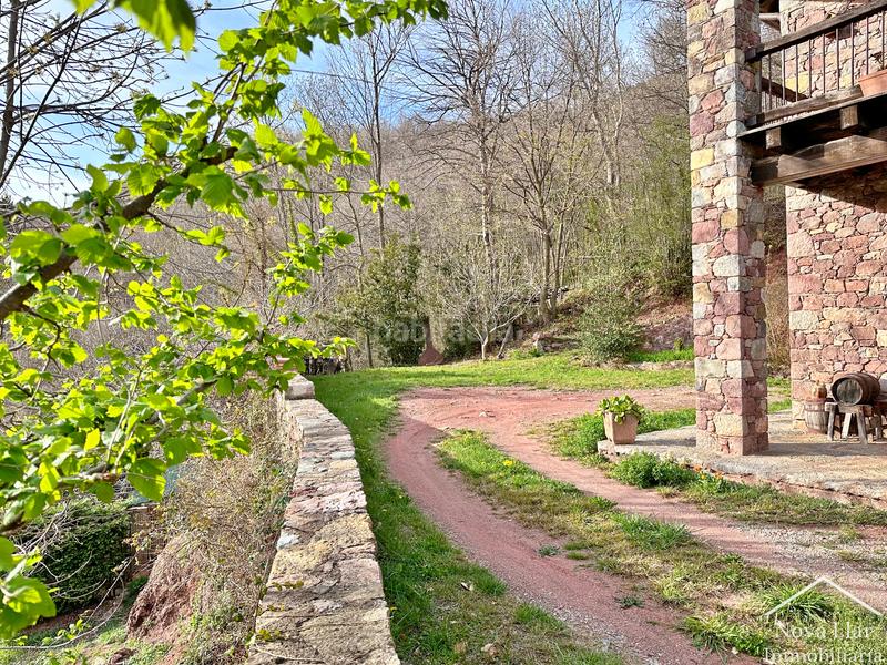 Foto d702f3a1-00b1-410a-9cbf-8a534366fbd7. Bauernhof mit kamin parking in Camprodon