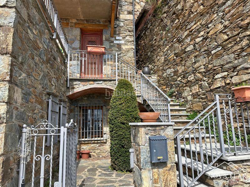 Foto 93396ee9-8ef4-4e46-b357-343ce70e3b1f. Casa aparellada amb xemeneia calefacció aparcament a Vilallonga de Ter