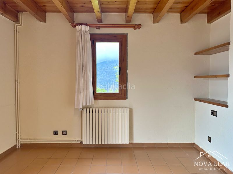 Foto db090bfd-4c1f-43e7-a74e-1728373e628a. Casa aparellada amb xemeneia calefacció aparcament a Vilallonga de Ter