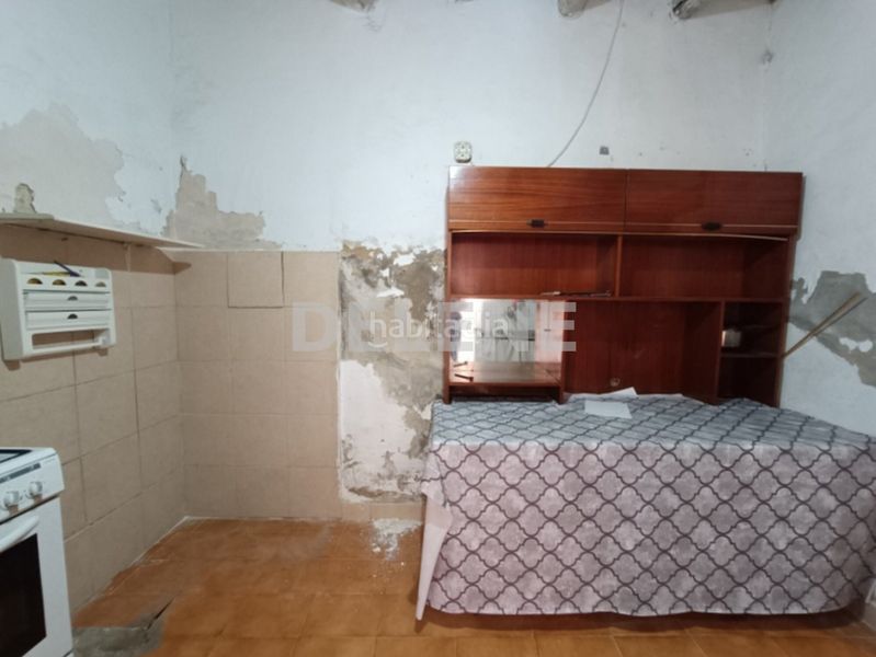 Foto 58d4c655-28a7-4261-b74b-bfe9a4b187de. Casa aparellada a Hellín