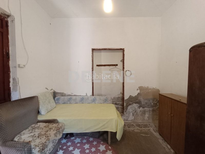 Foto b09a4c89-f8d5-404c-9f21-f0f86d597755. Casa aparellada a Hellín