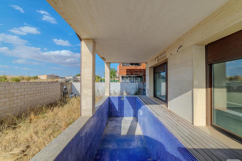 Foto 4f9d7d69-f548-450d-bb90-68bcda8f0814. Chalet avec chauffage parking piscine dans San Isidro - Espíritu Santo Zamora