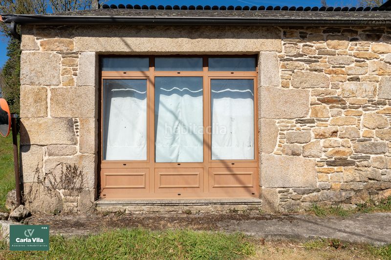 Foto 4beb8450-ec58-473b-87e6-892197c85b57. Masia amb xemeneia a Begonte