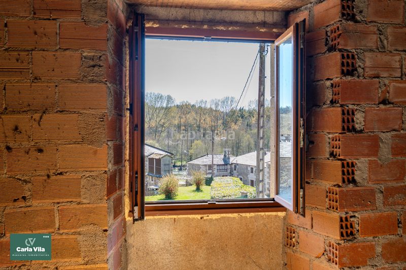 Foto 83683c1d-4b73-4f59-b58c-f9432386958c. Masia amb xemeneia a Begonte