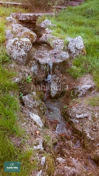 Foto b0b03959-fa1f-49a8-bde2-541ce34a426a. Masia amb xemeneia calefacció aparcament a Guitiriz