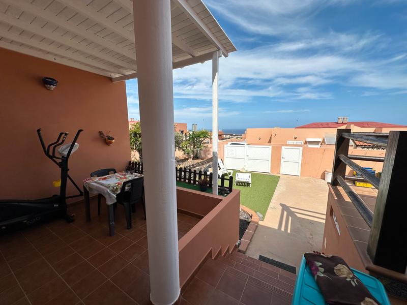 Foto 76f1da6c-ec9e-48f9-96e8-5166789f05e9. Reihenhaus mit parking in Caleta de Fuste Antigua