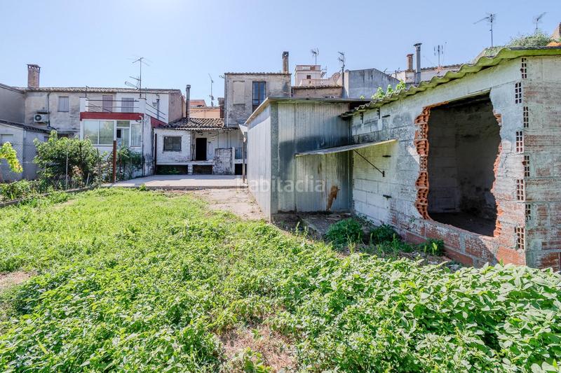 Foto f9e0bc88-3309-4e92-a658-b8417e1c1d29. Casa adosada  para reformar en venta en Llagostera