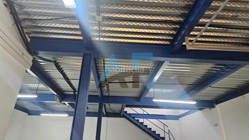 Foto 4cb2fc58-c304-48ec-9f17-e3febc213b1c. Lloguer nau industrial a Vilamarín