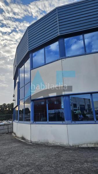 Foto 98ddb3d5-74f9-4026-bd7a-ea06b5267236. Bâtiment à usage industriel dans Vilamarín