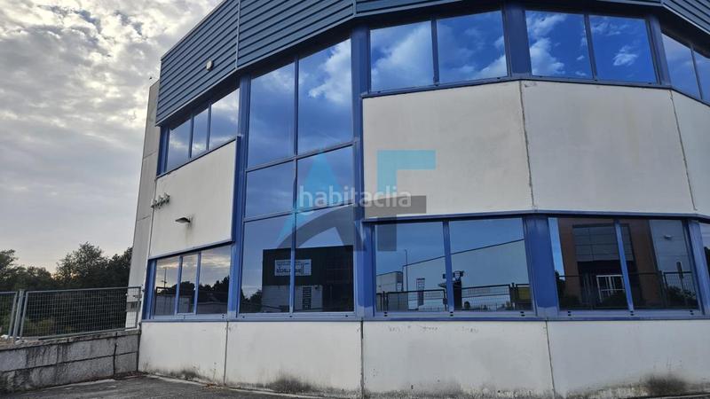 Foto d6f82f8e-2891-404d-b813-df21cf6bb849. Bâtiment à usage industriel dans Vilamarín